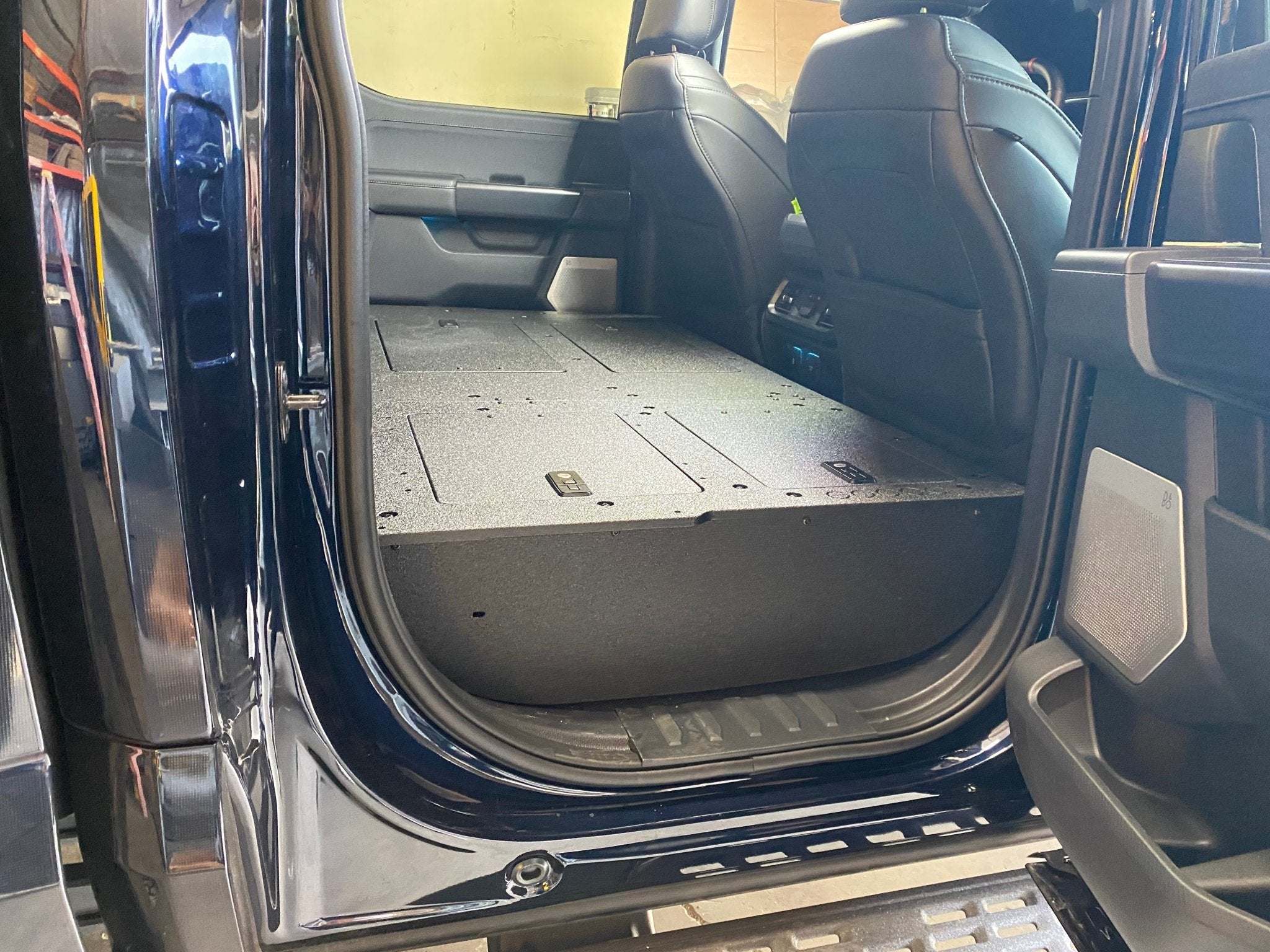 Ford Super Duty Ford - F250-F550 - 2023-Present - 5th Gen. Crew Cab - Second Row Seat Delete Plate System with Factory B&O Subwoofer Center Wall with Exterior Port